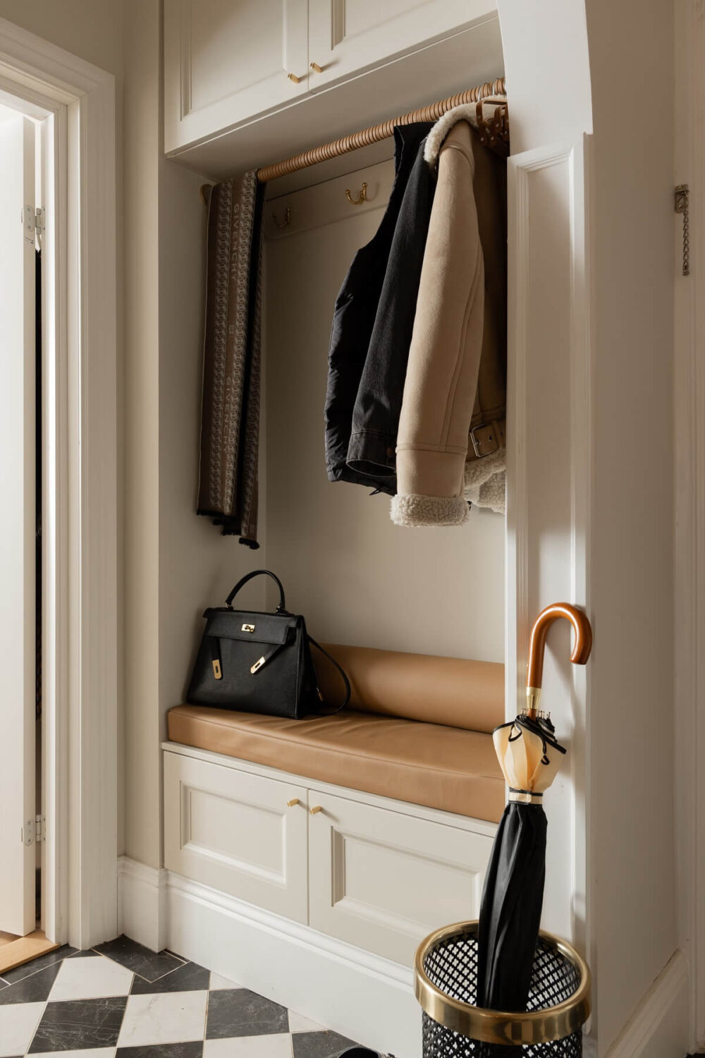 A Classic Look for a Swedish Apartment 17 hallway storage with built in cabinets and checkerboard floor nordroom