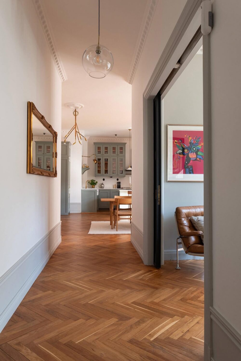 An Elegant Turn-of-the-Century Apartment in Stockholm 16 hallway with parquet floor