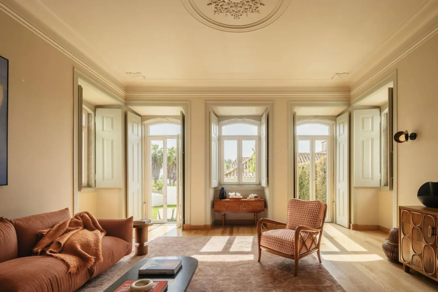 Color Touches in a Design Apartment in a Historic Villa 1 light filled living room beige walls nordroom