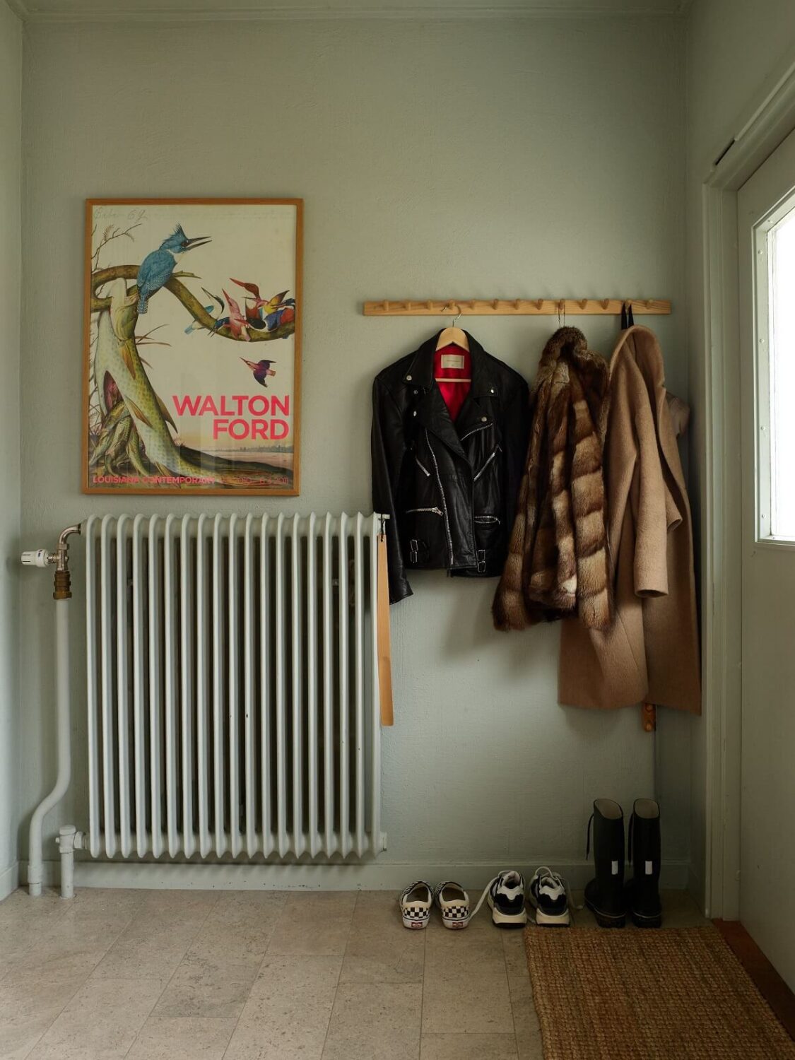 A Charming School Conversion in Sweden 13 light green hallway