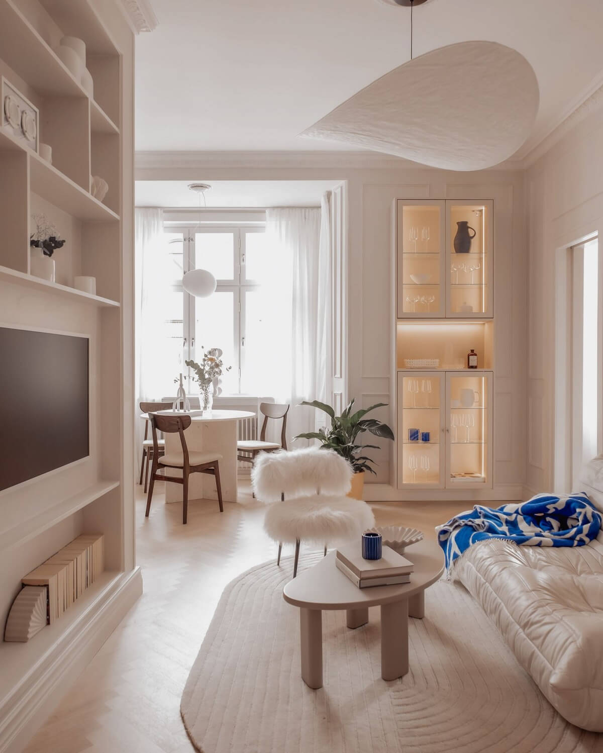 A Serene and Luxurious Apartment in Stockholm 1 living room with built in shelves nordroom