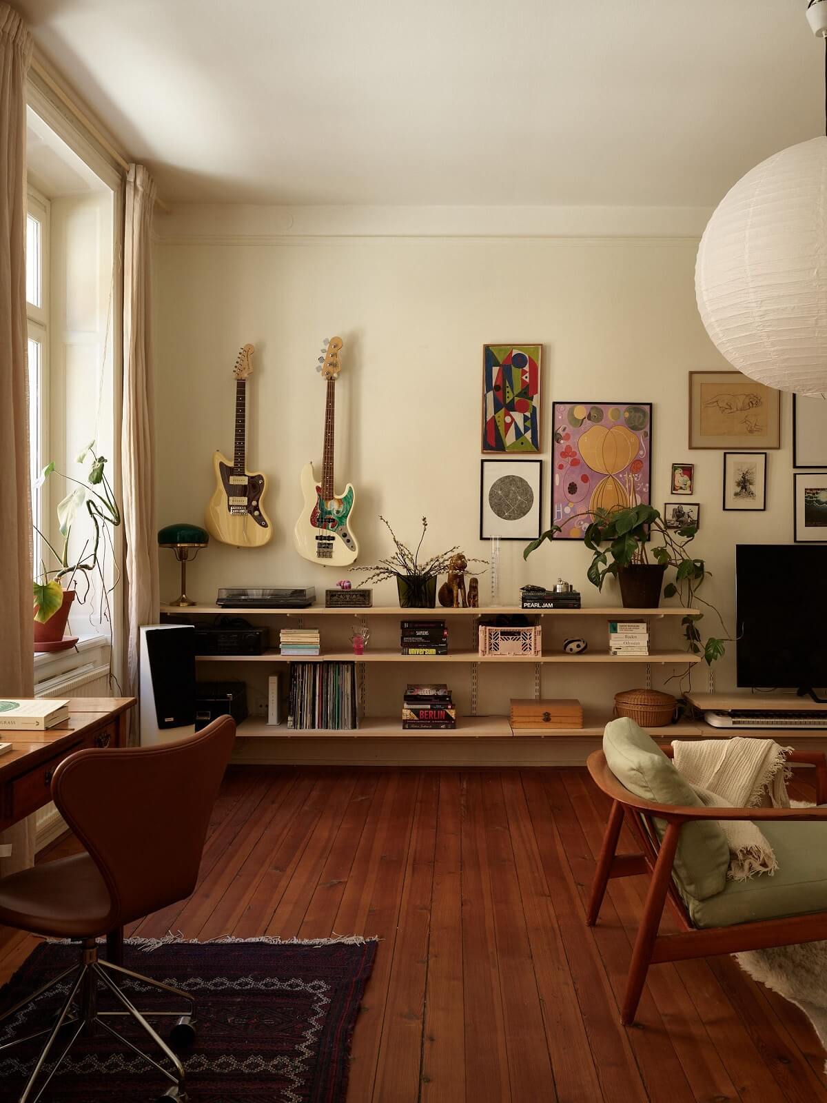 living room with warm wooden floor and shelves nordroom