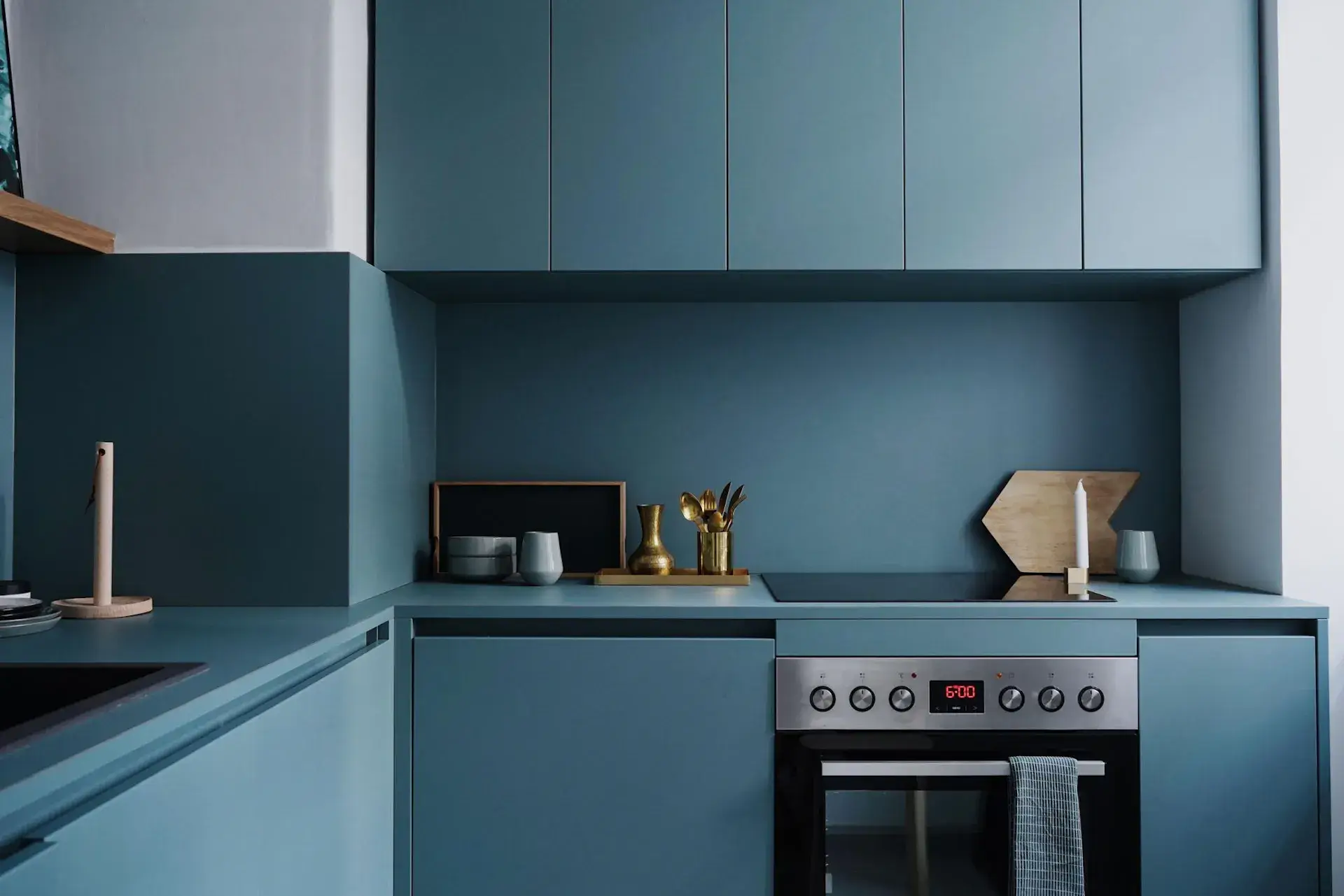 modern kitchen with blue cabinets