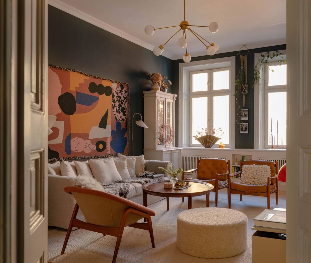 Best of 2024: Living Rooms 22 moody living room with colorful art