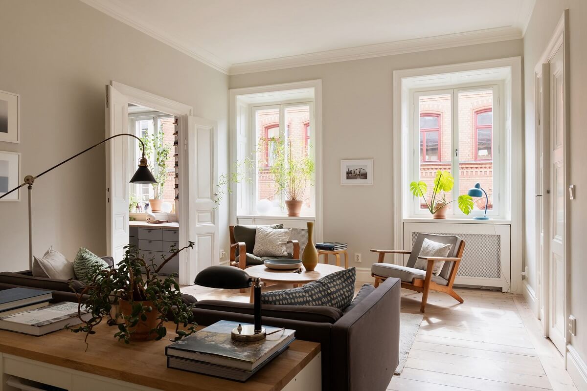 Light Rooms in a Renovated Historic Apartment in Stockholm 1 table against back of the sofa nordroom
