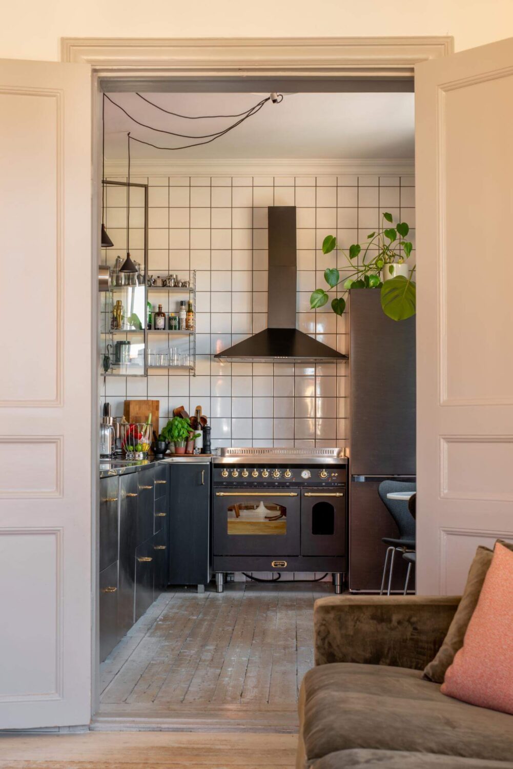 A Corner Apartment with an Industrial Style Kitchen 6 view into industrial style kitchen nordroom