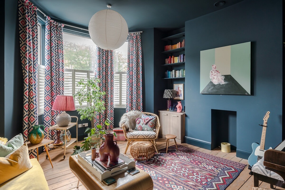 A London Home with an Oak-Framed Glazed Extension 1 blue sitting room with bookshelves
