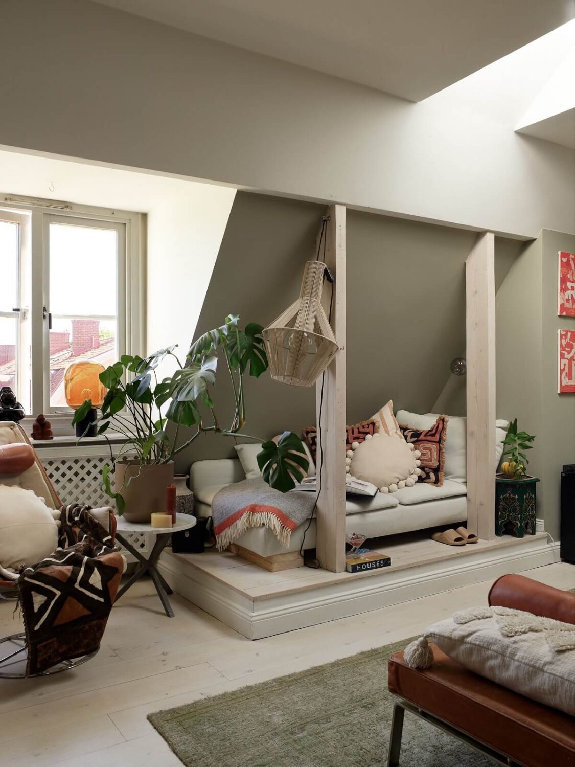 Best of 2024: Living Rooms 34 cozy living room with seating nook under slanted ceiling