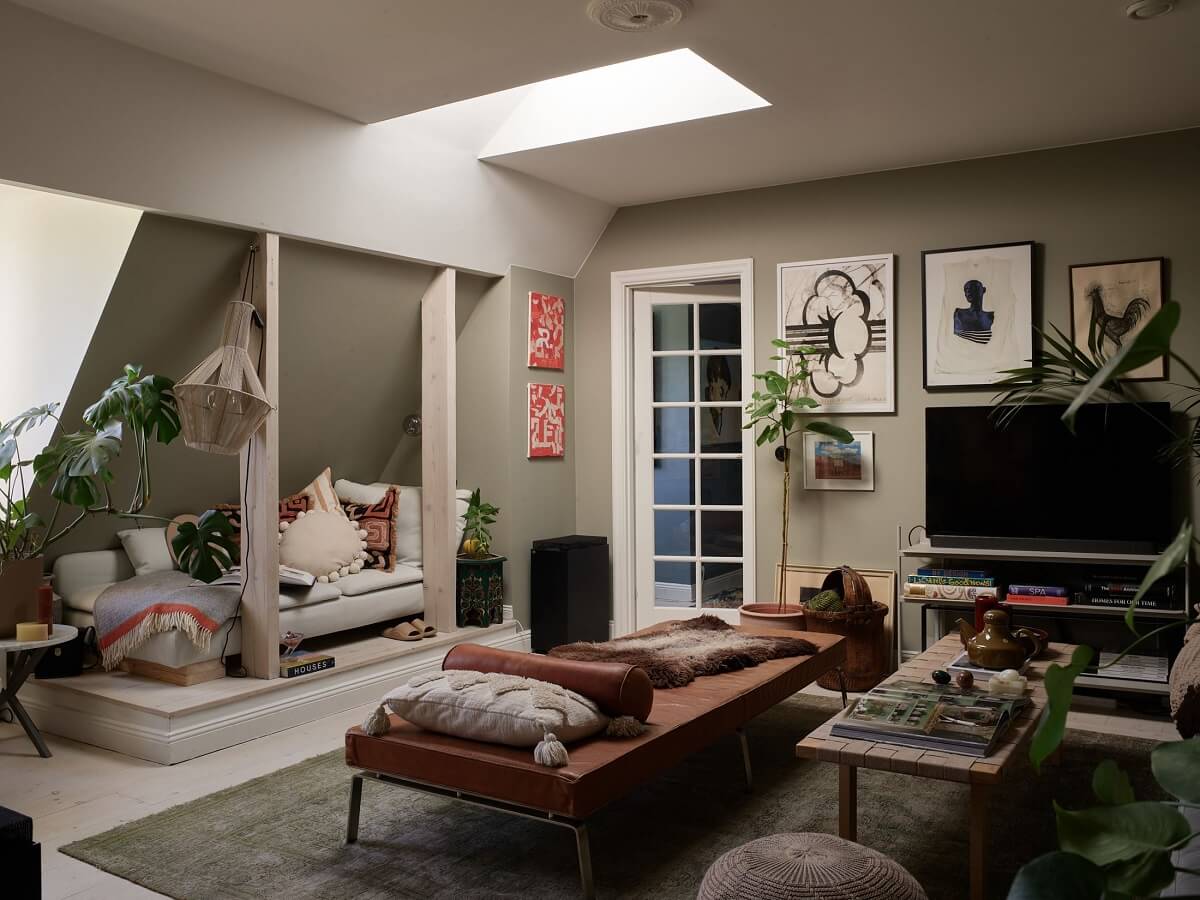 Best of 2024: Living Rooms 33 cozy living room with slanted ceiling and skylight