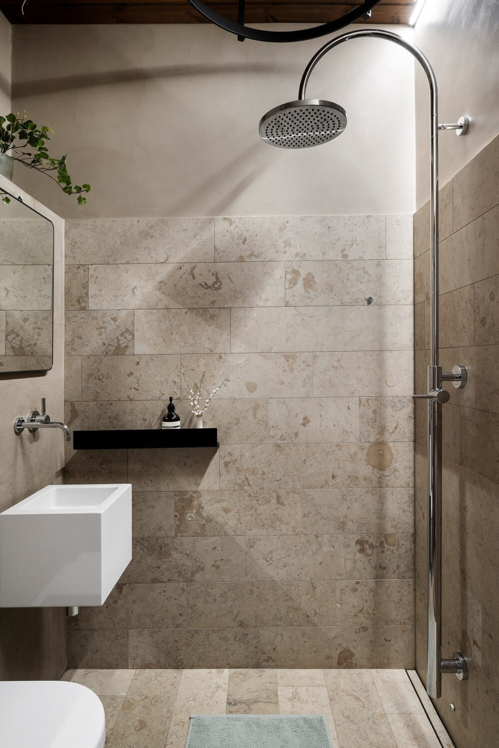 A Stylish Scandinavian Duplex with Custom-Made Cabinets 25 gray bathroom