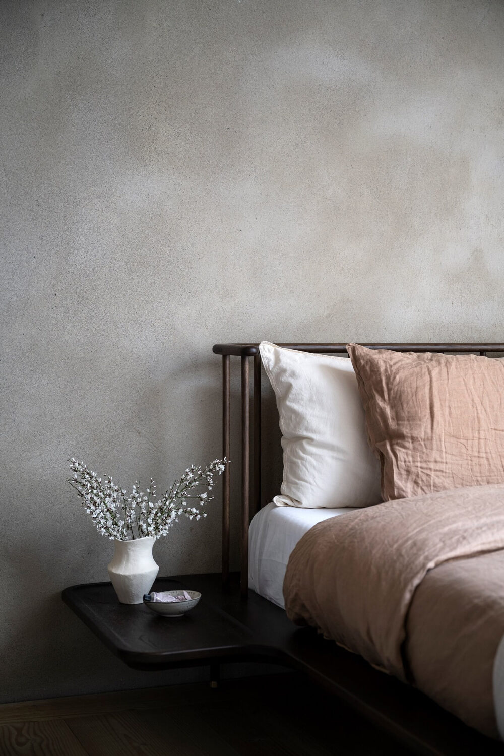 A Stylish Scandinavian Duplex with Custom-Made Cabinets 22 gray wall bedroom pink bedding