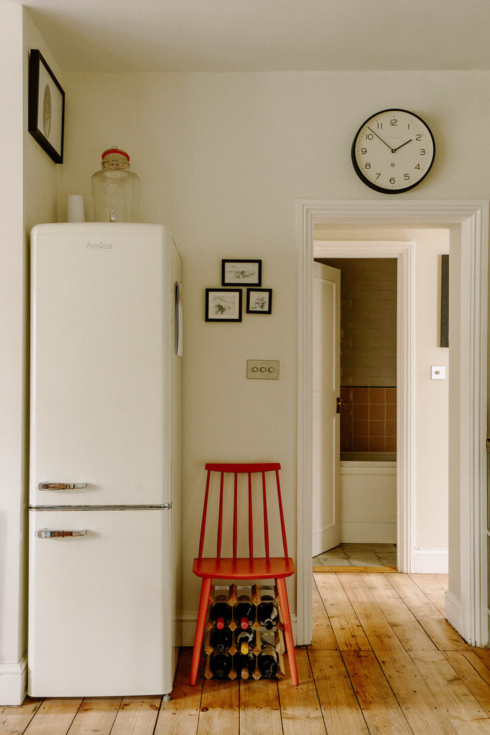 A Charming Apartment in a Victorian Villa 5 kitchen detail red chair A Charming Apartment in a Victorian Villa