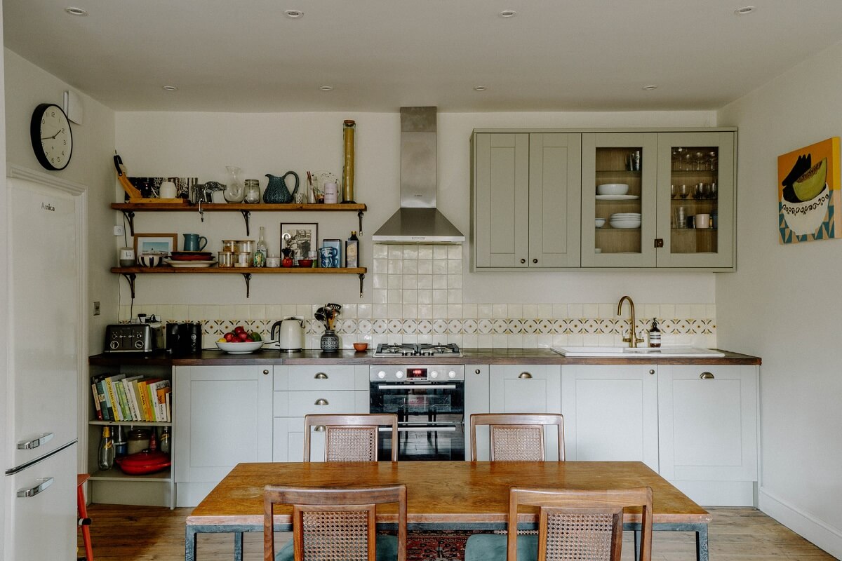 A Charming Apartment in a Victorian Villa 3 kitchen with dining table and shelves