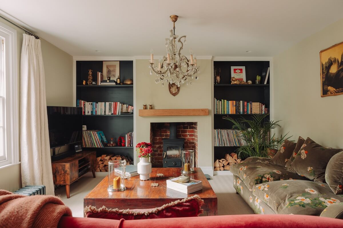 Colorful Rooms in an Elegant Georgian Home in England 1 living room with fireplace and black painted built in shelves