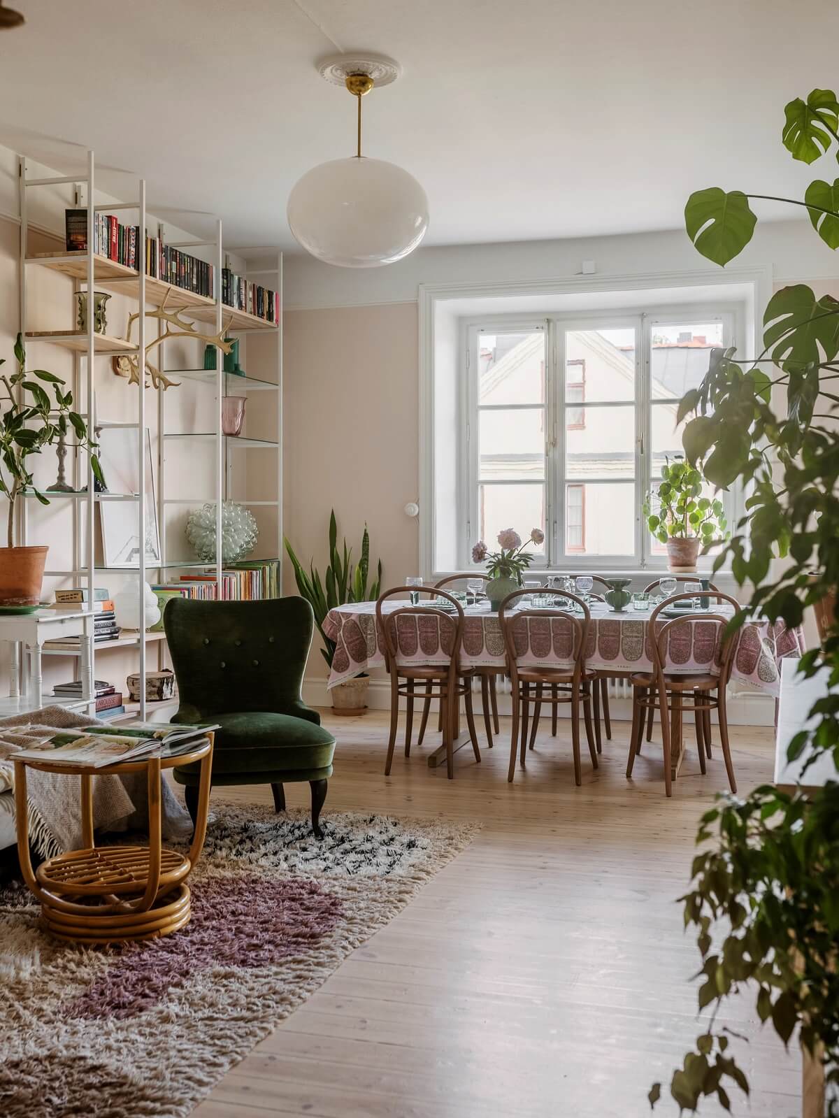 living room with shelves and dining table nordroom