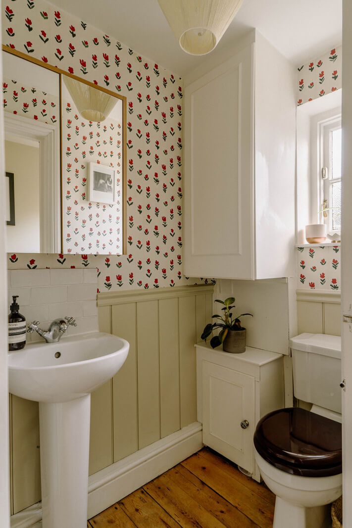 A Charming Apartment in a Victorian Villa 14 powder room wallpaper paneled walls A Charming Apartment in a Victorian Villa