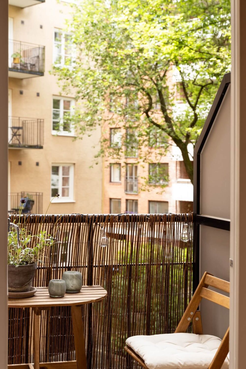 Warm Colors and Painted Ceilings in a Swedish Apartment 18 small courtyard balcony