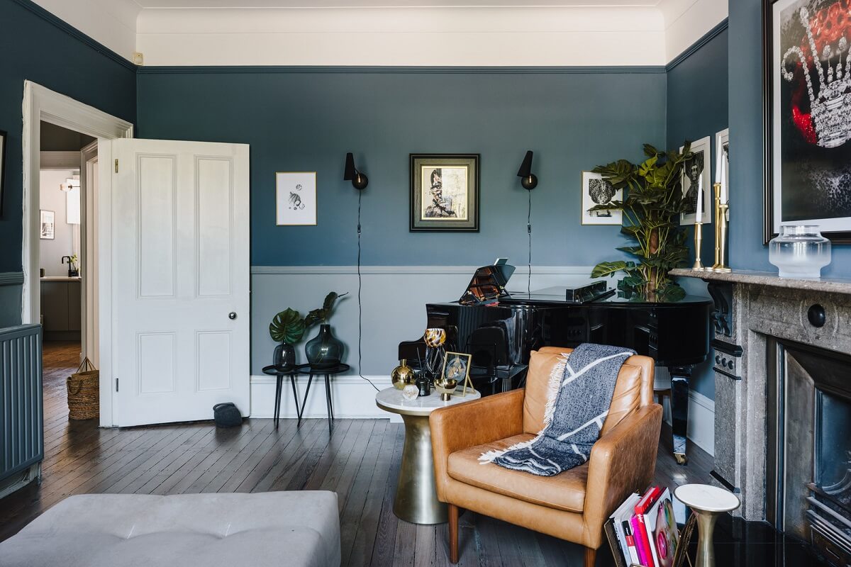 A Deep Blue Color Palette in a London Apartment 3 two tone blue walls living room