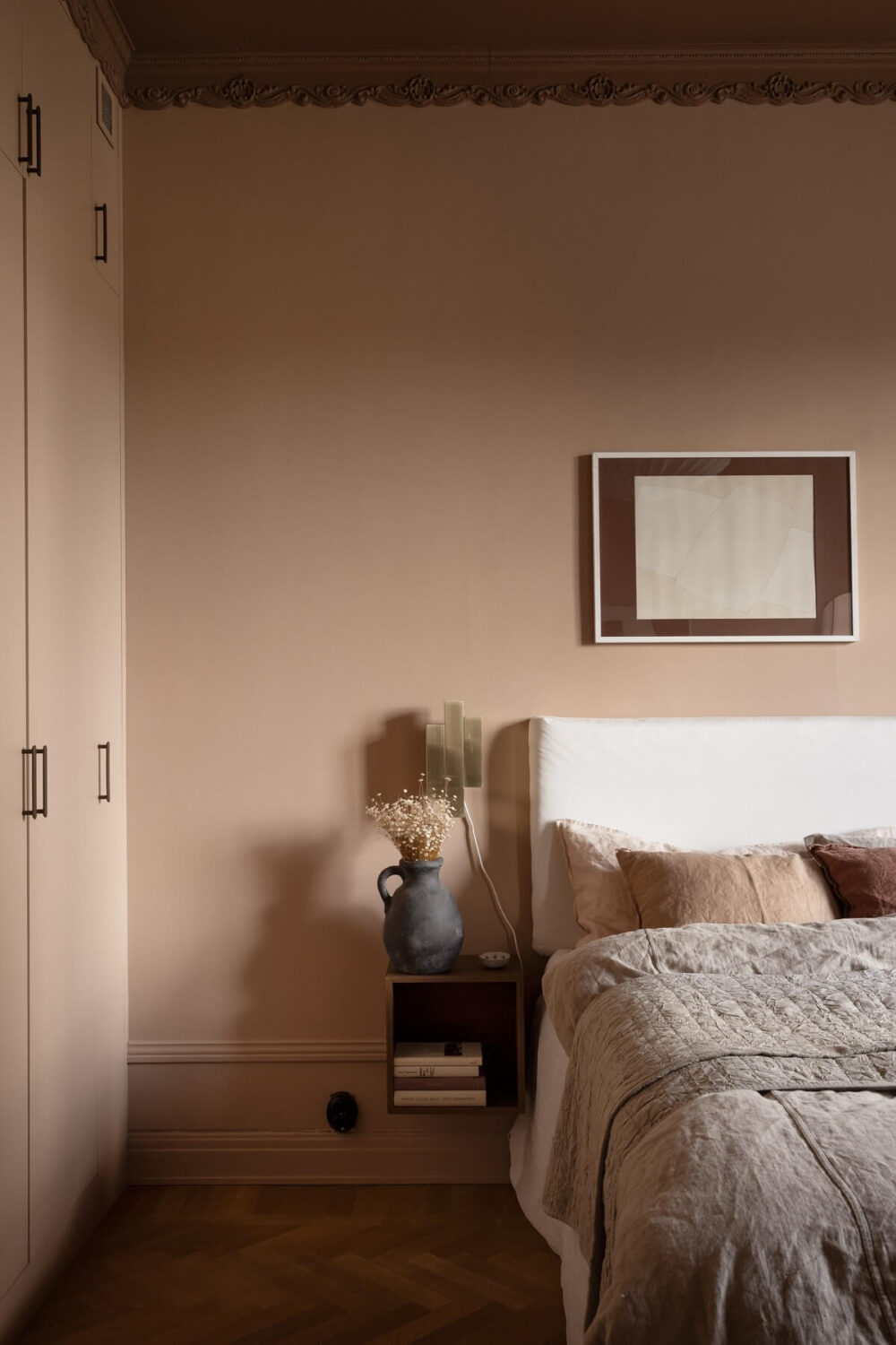 Warm Colors and Painted Ceilings in a Swedish Apartment 14 warm bedroom with darker painted ceiling nordroom