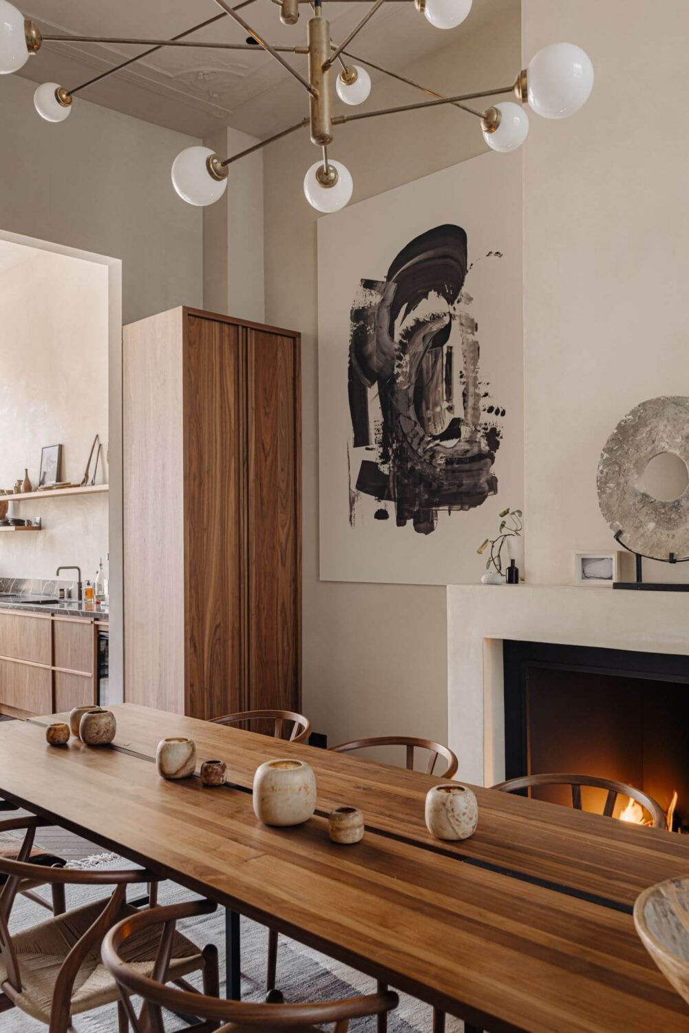A Luxurious Apartment in an Amsterdam Canal House 4 wooden dining table with fireplace