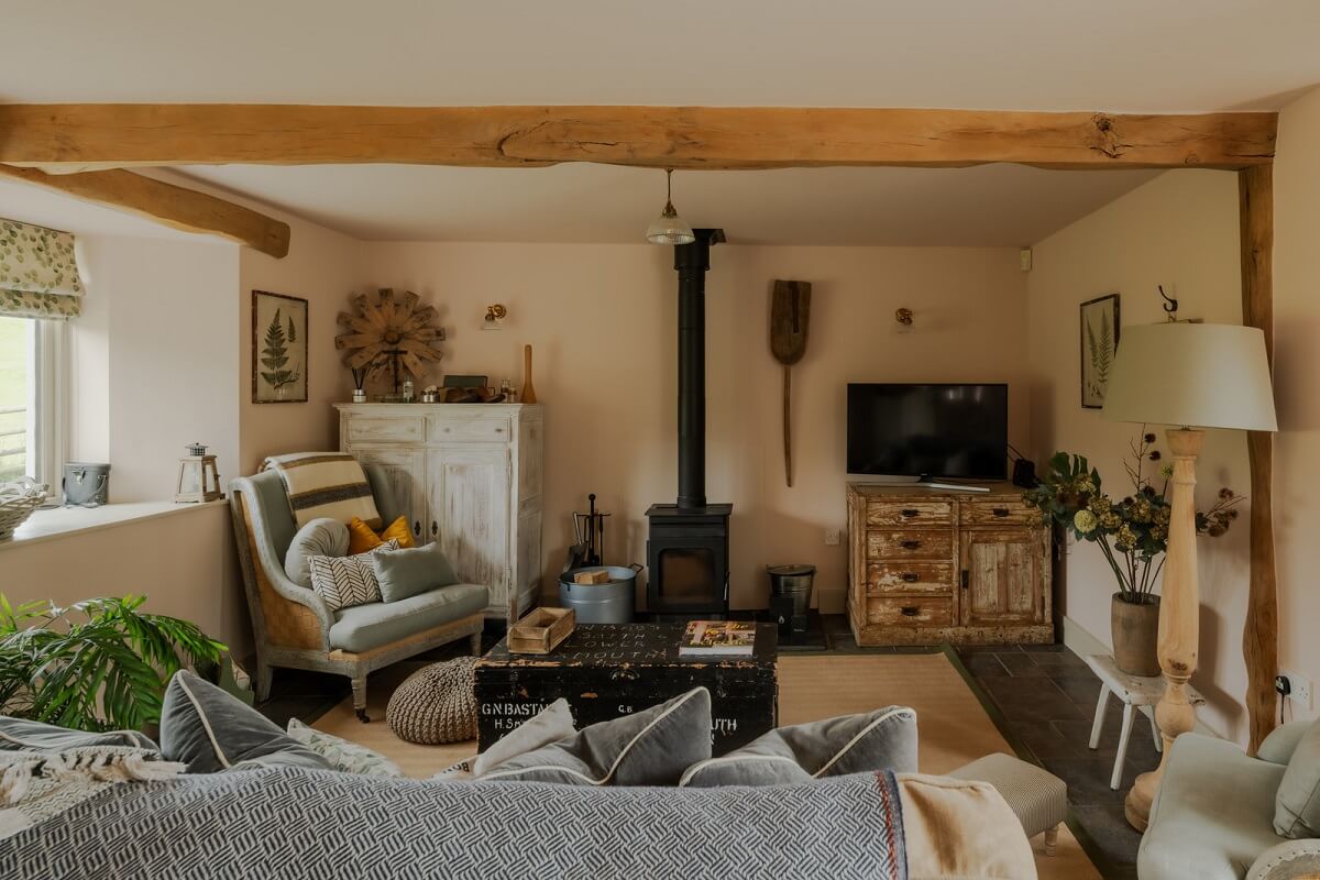Cottage-Style Interiors in an English Barn Conversion 1 cottage living room with wooden beam
