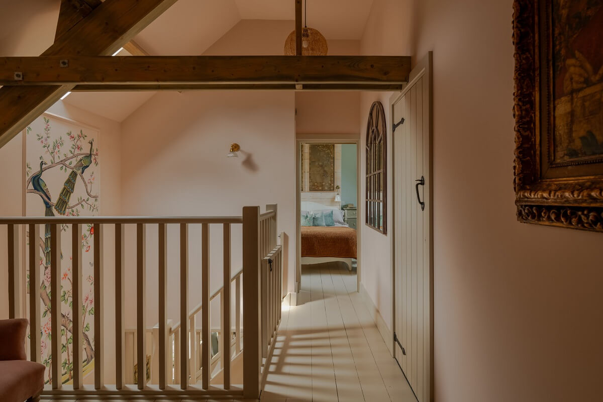 Cottage-Style Interiors in an English Barn Conversion 16 first floor landing with pink walls nordroom