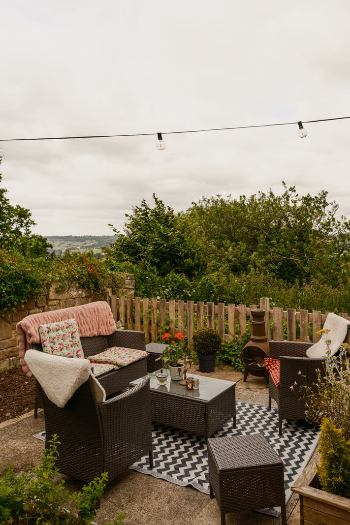 A Black Barn House with Boho Interiors and Breathtaking Views 15 garden seating