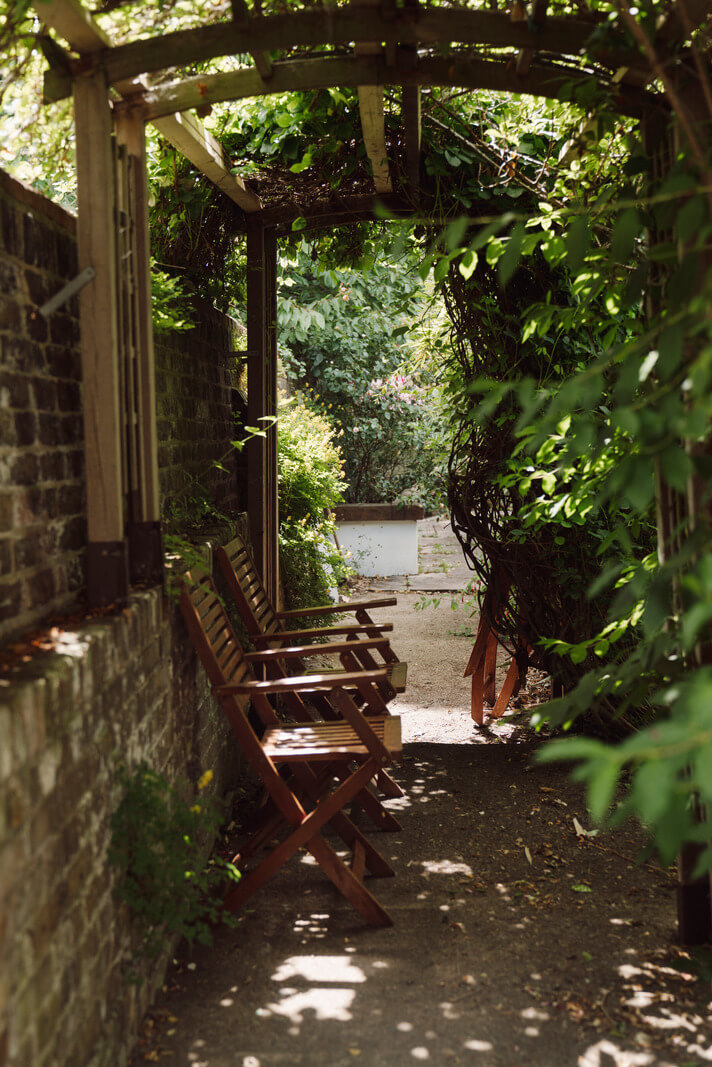 A Moody Color Palette and Eclectic Interiors in a London Apartment 18 garden seating 3 A Moody Color Palette and Eclectic Interiors in a London Apartment