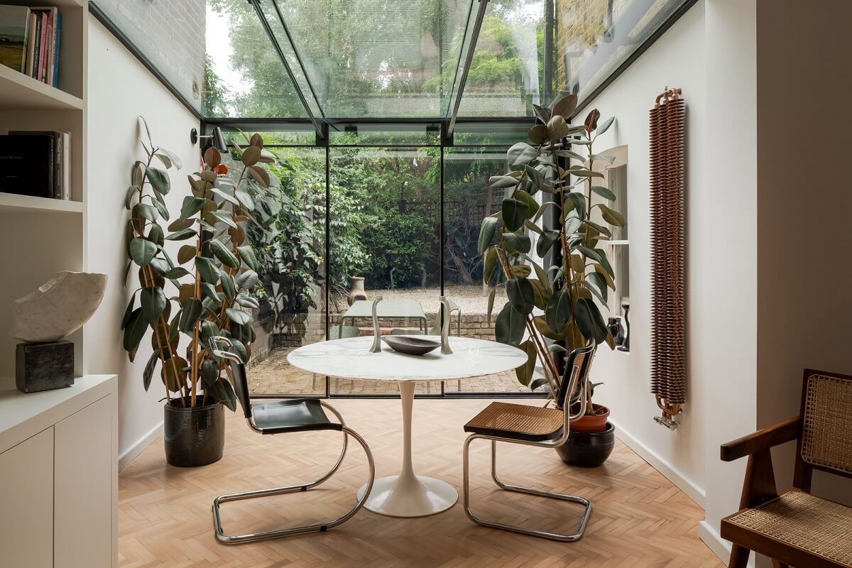 Pared Back Interiors and Light-Filled Spaces in a London Apartment 1 glass extension living room
