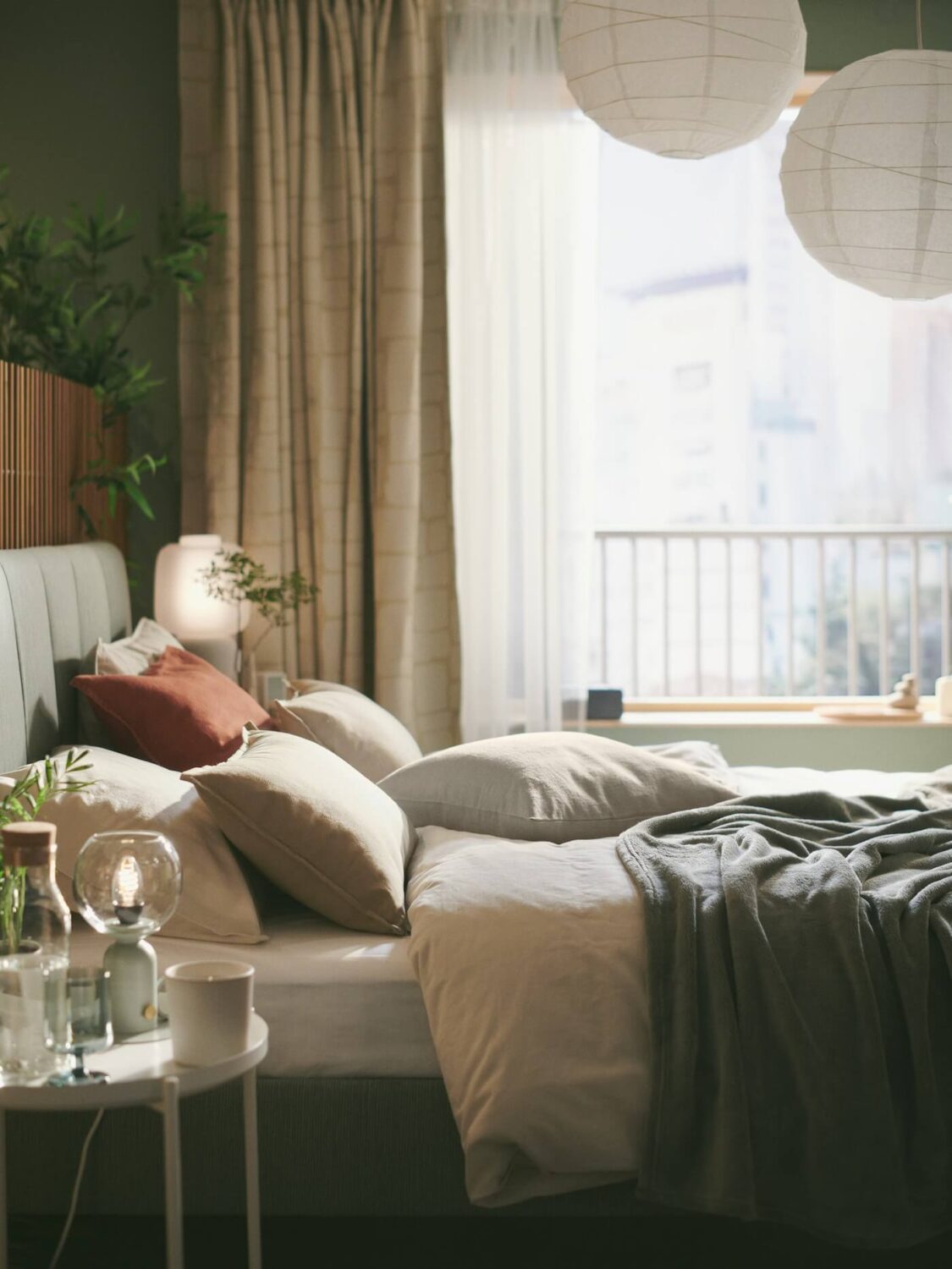 A Sage Green IKEA Bedroom with A Walk-In Closet 3 green ikea bedroom with layered textiles nordroom