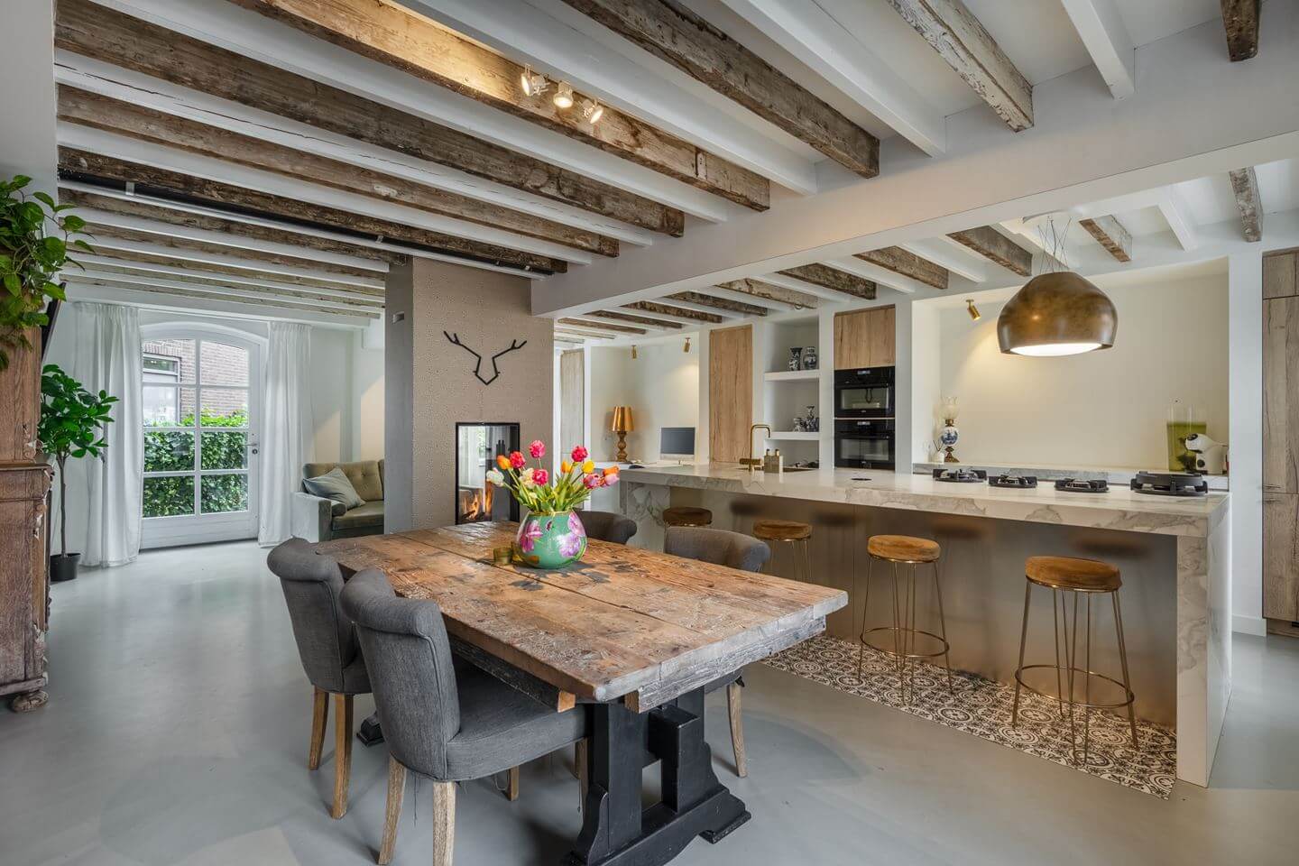 A Beautiful Loft Style Home in a Former Dutch Factory 1 kitchen with wooden beams