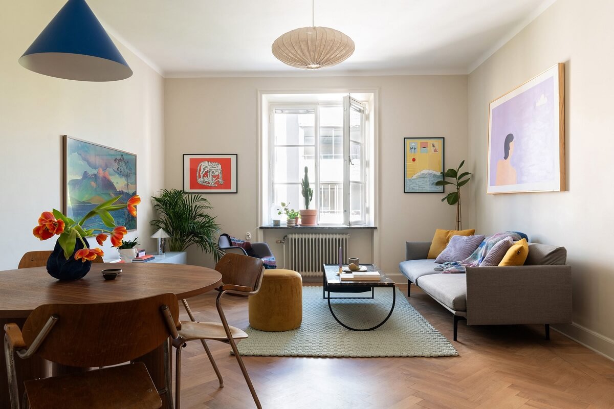A Renovated Stockholm Apartment with Subtle Color Details 1 modern living room with round table