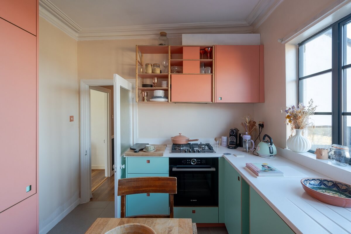 A London Apartment with a Turquoise and Pink Kitchen 1 pluck kitchen pink and tuquoise cabinets nordroom