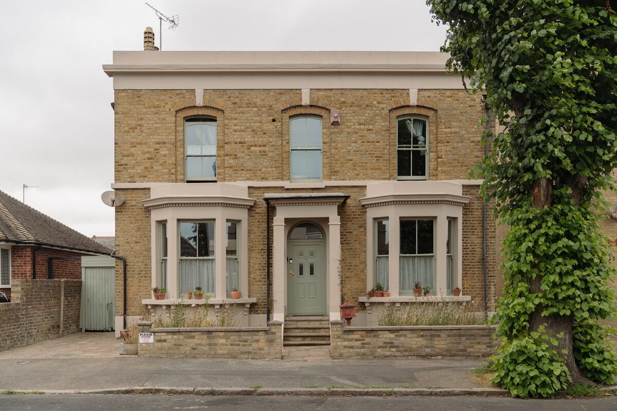 Pared Back Interiors in an English Home in Kent 29 exterior sage green ront door Pared Back Interiors in an English Home in Kent