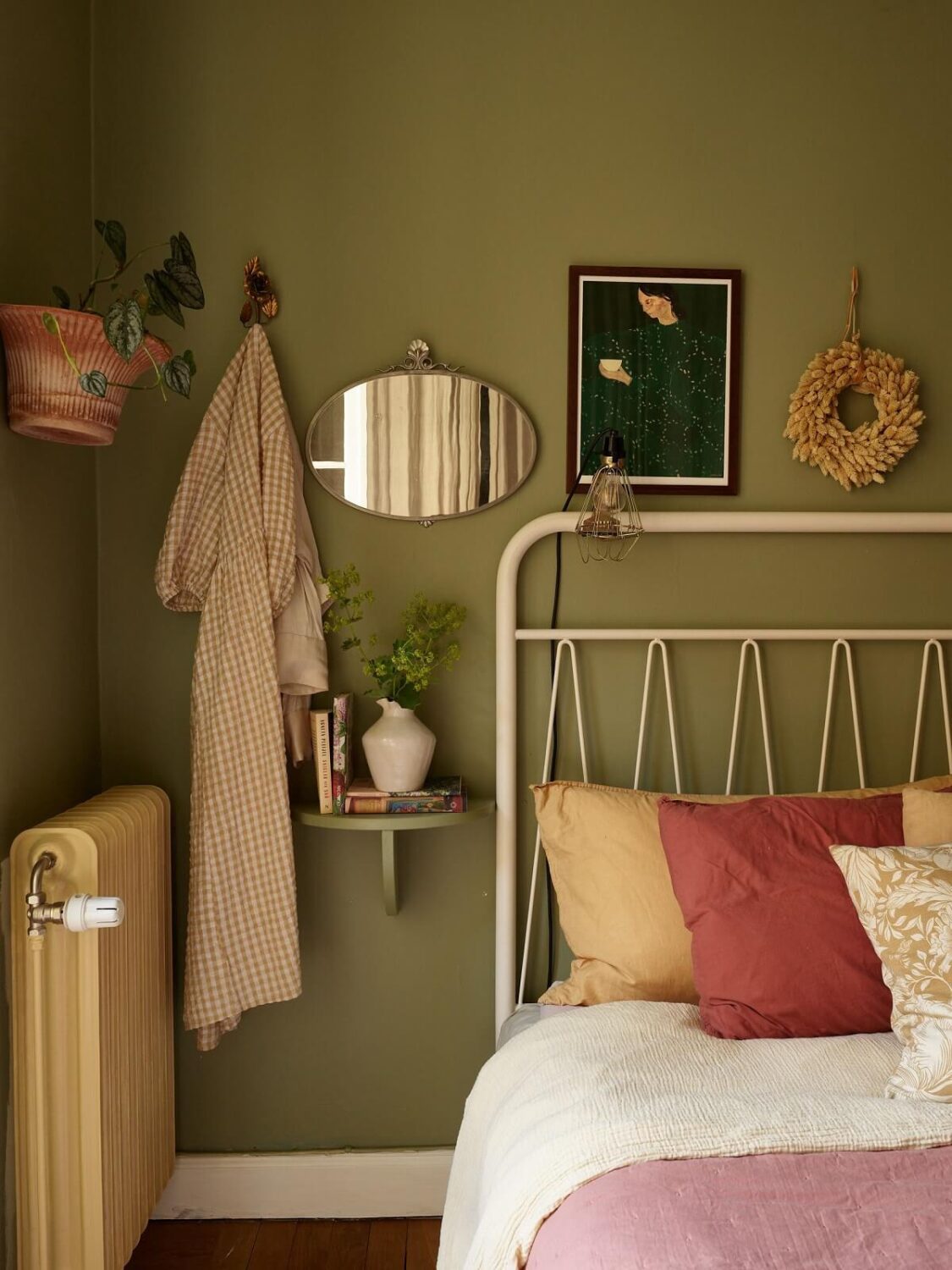 A Cozy 1920s Apartment with Original Details and Wallpaper 19 green vintage bedroom detail nodrroom