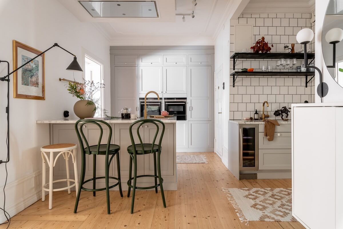 A Scandinavian Apartment with a Pale Yellow Living Room 14 kitchen light gray cabinets whit tiles