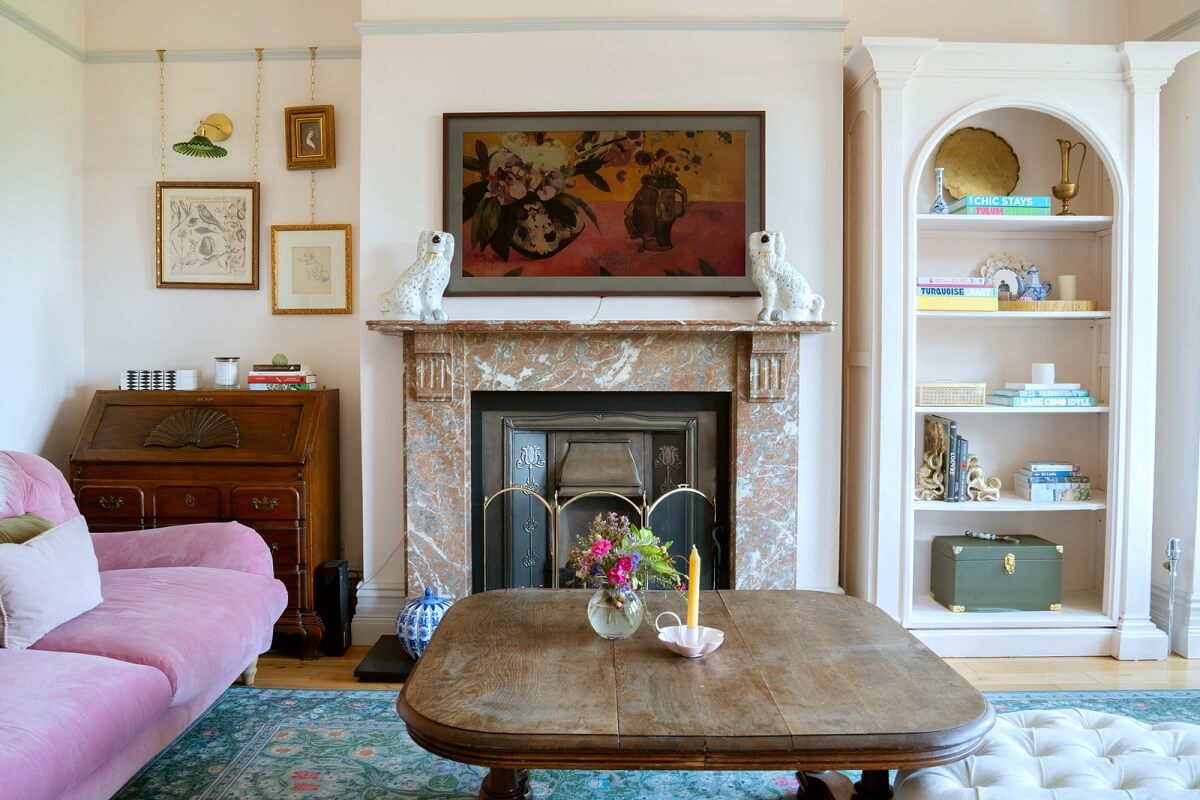 A Beautiful Edwardian House with Period Features 1 living room with pink sofa fireplace and built in shelces