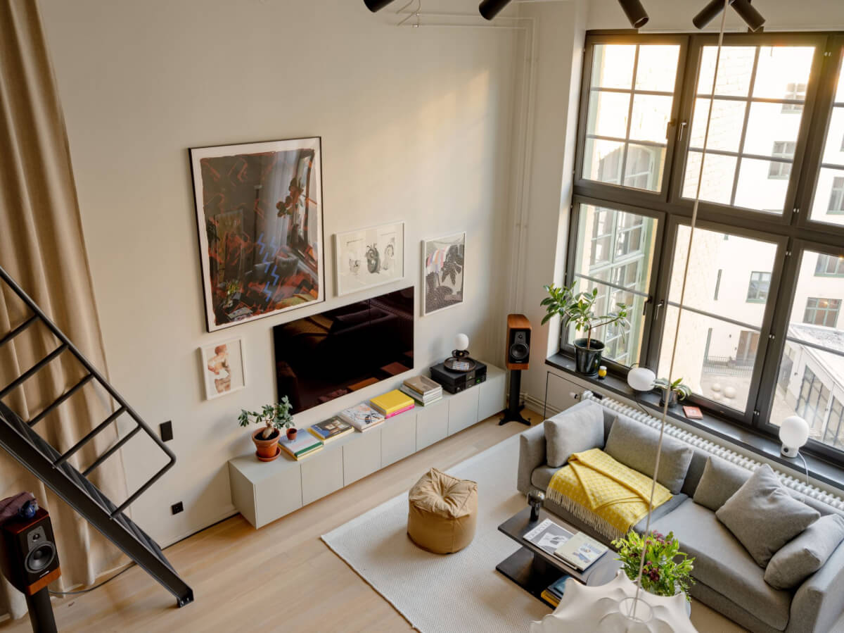 A Monochrome Loft with High Ceilings and Art 9 loft space high windows