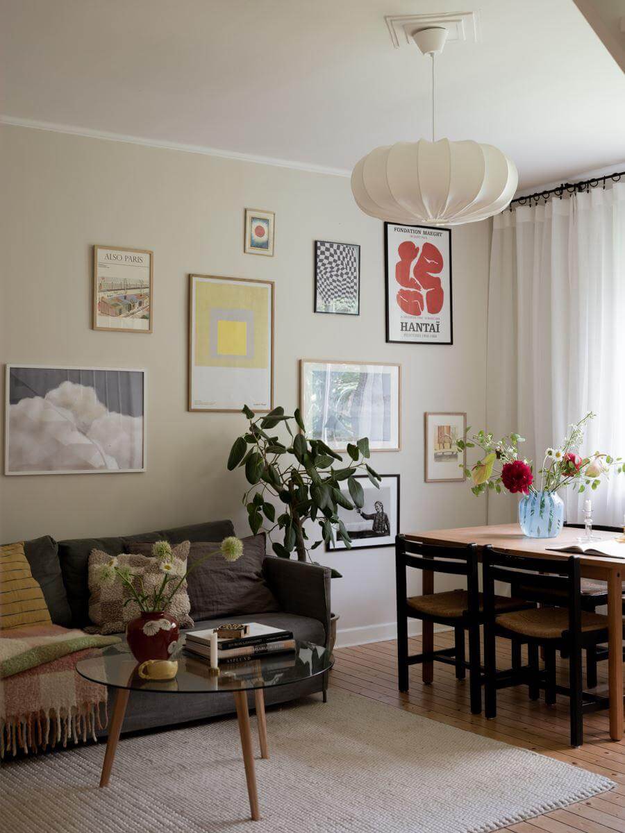 A Beautiful Renovated Maisonette Home with a Calm Color Palette 3 scandinavian living room with light gray walls and art