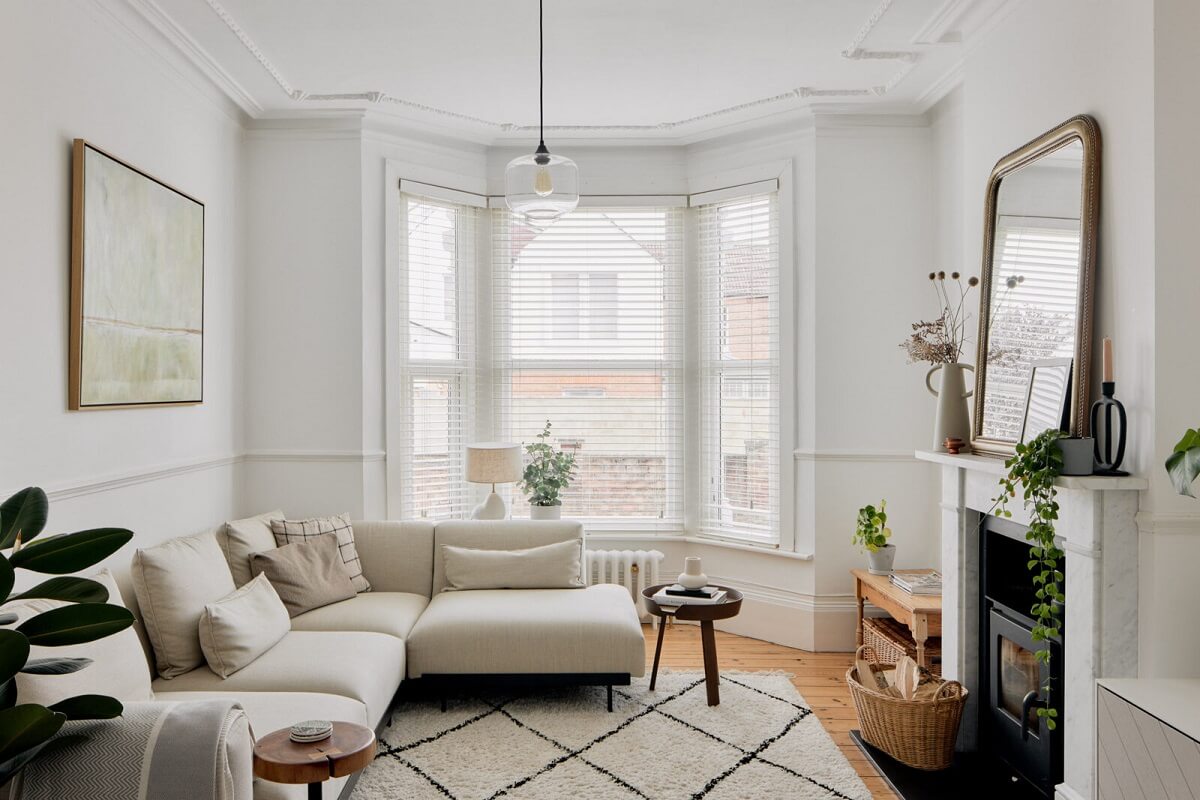 Light and Modern Spaces in an Award-Winning London House 1 white living room with bay window and fireplace nordroom