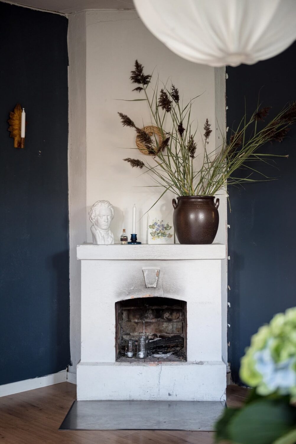A Charming Country House with a Pink Dining Room and Wallpapers 17 blue living room white fireplace