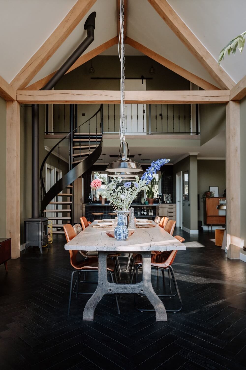 Historic Charm in a New Country House in The Netherlands 1 dining room with pitched ceiling and wooden beams