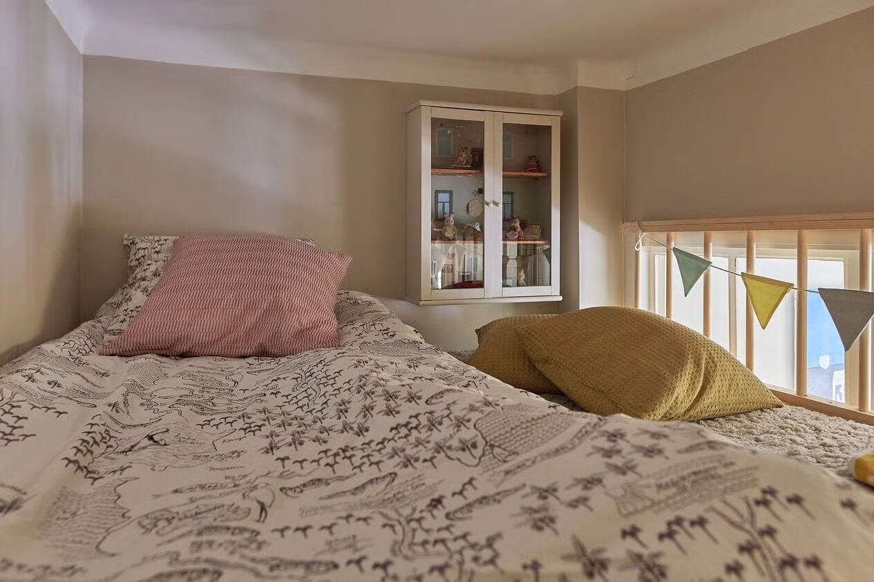 Soothing Colors and Smart Solutions in a Two Bedroom Apartment 18 loft bed with glass cabinet