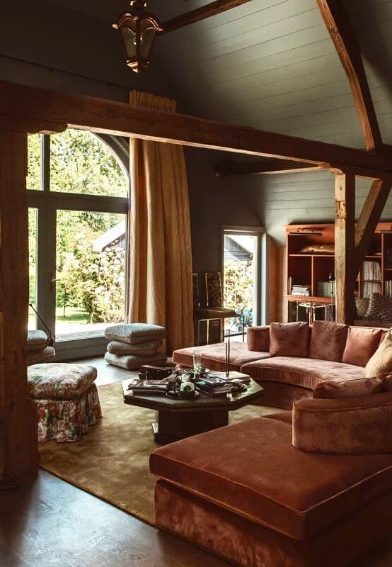 Best of 2024: Living Rooms 39 pitched ceiling living room wooden beams pink sofa