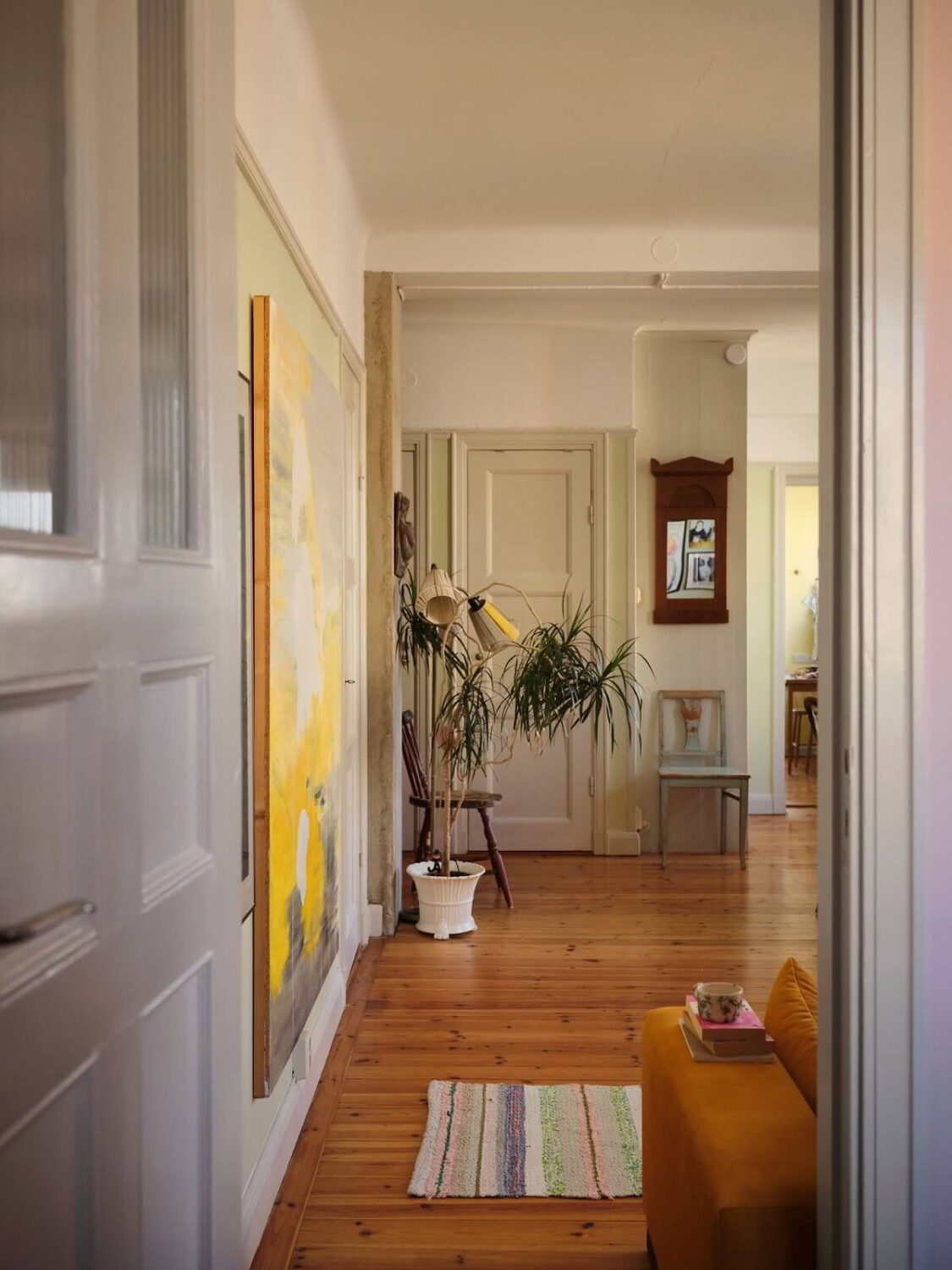 A Charming Small Two-Bedroom Apartment in Stockholm 4 view into living room wooden floor