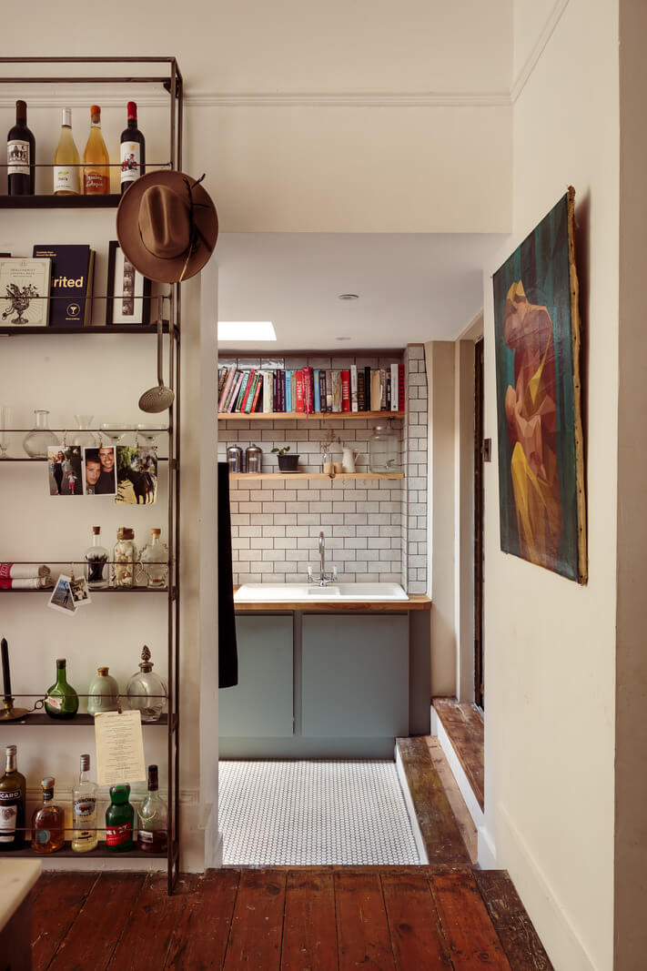 A Warm Ground Floor Apartment with Reclaimed Materials 9 view into utility room