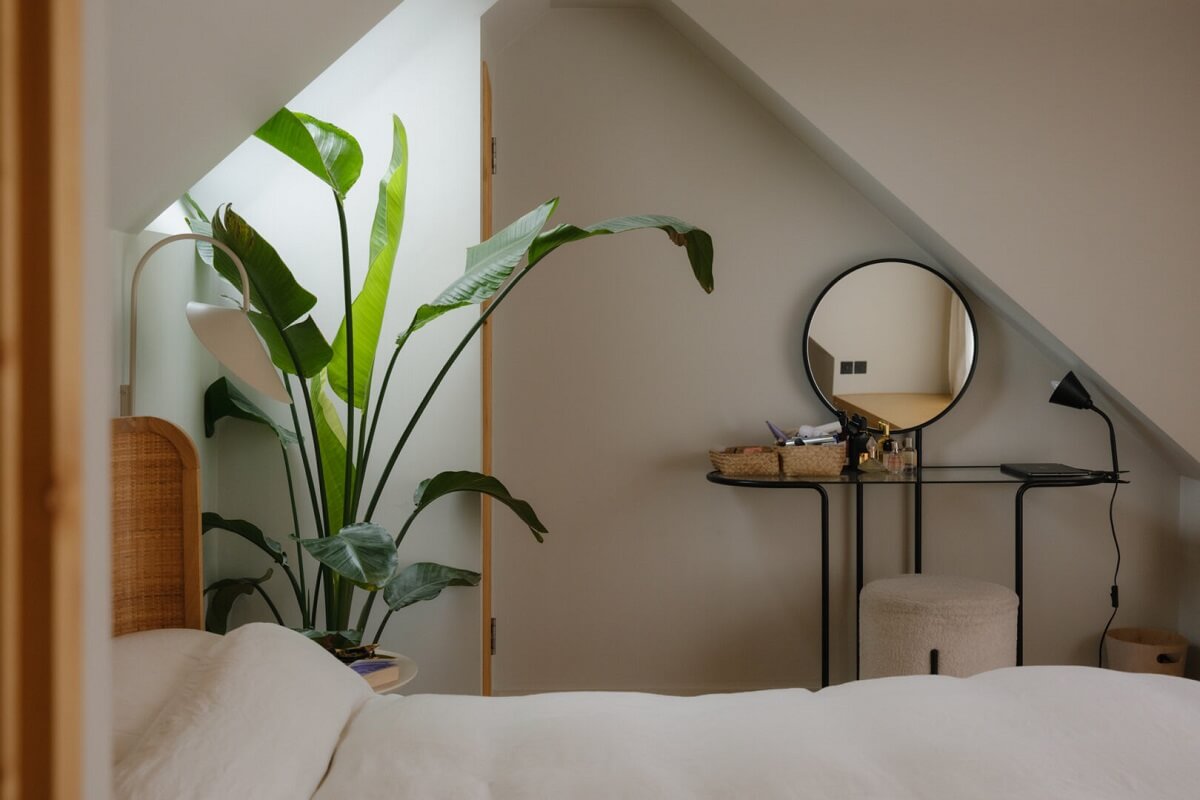 Nature-Inspired Colors in an Extended East London Home 19 attic gray bedroom
