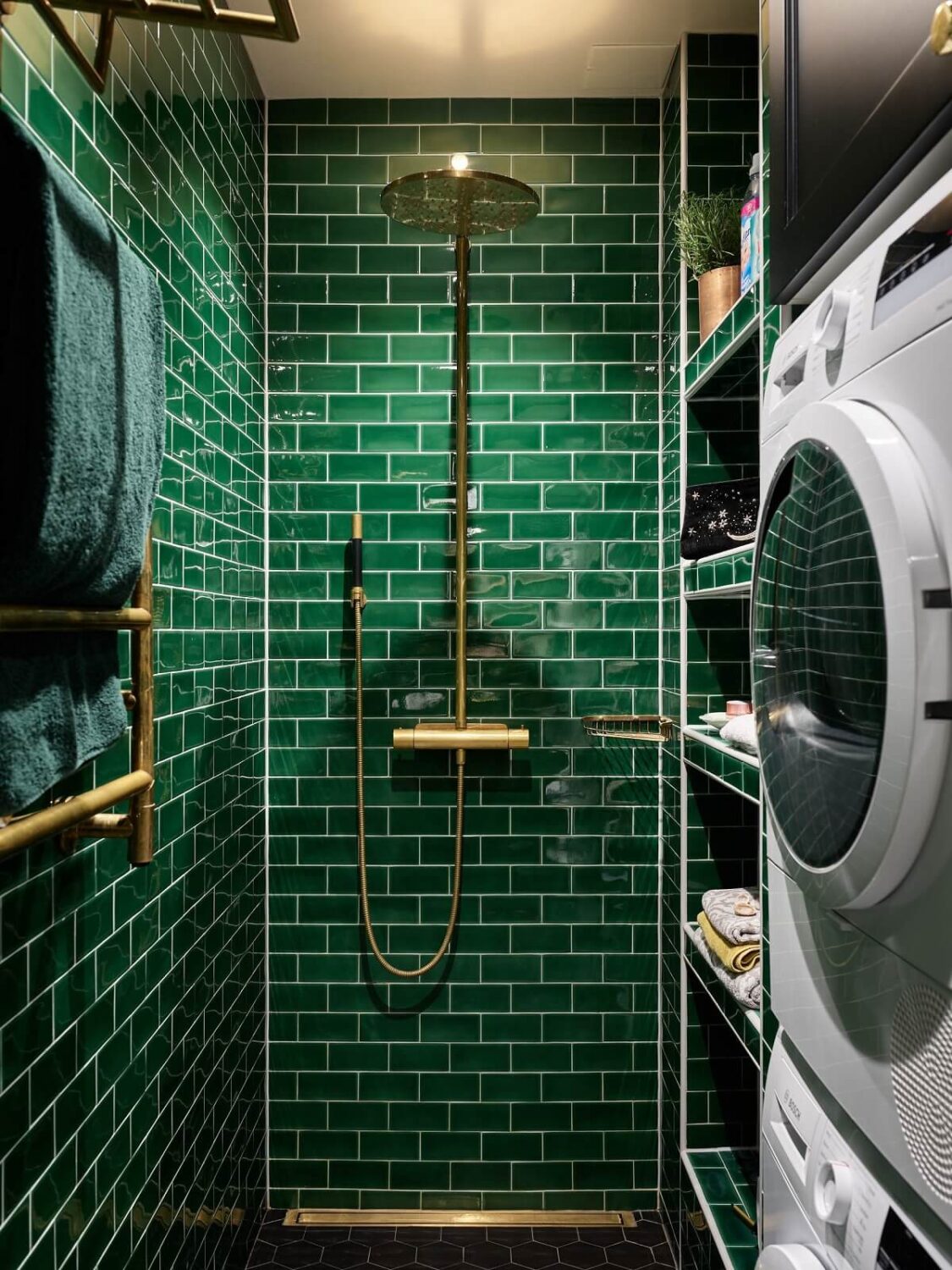 Pink and Green Rooms and Charming Wallpapers in a Family Apartment 30 bathroom dark green tiles washer dryer space nordroom