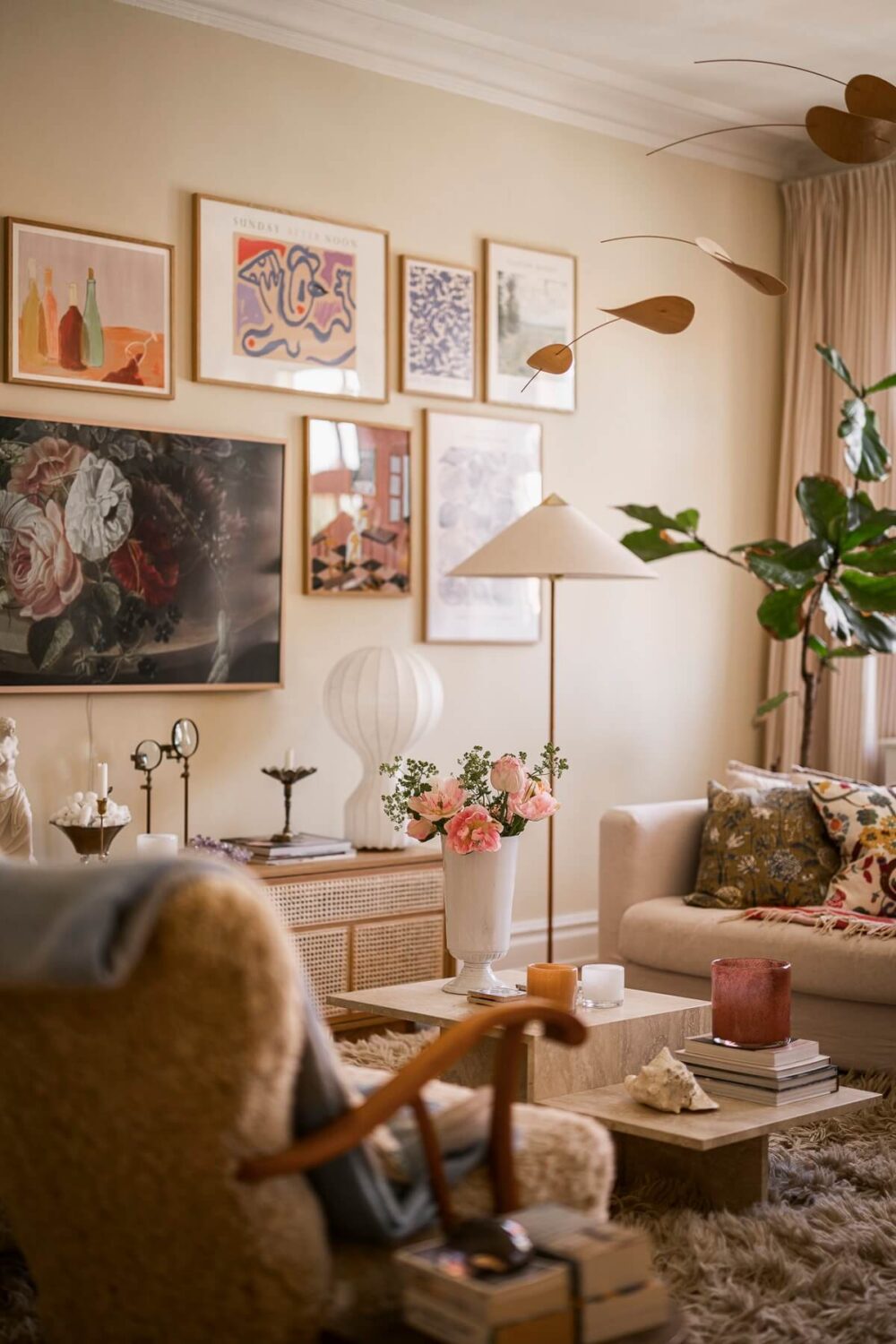 Best of 2024: Living Rooms 9 hygge living room with light yellow walls large rug and gallery wall