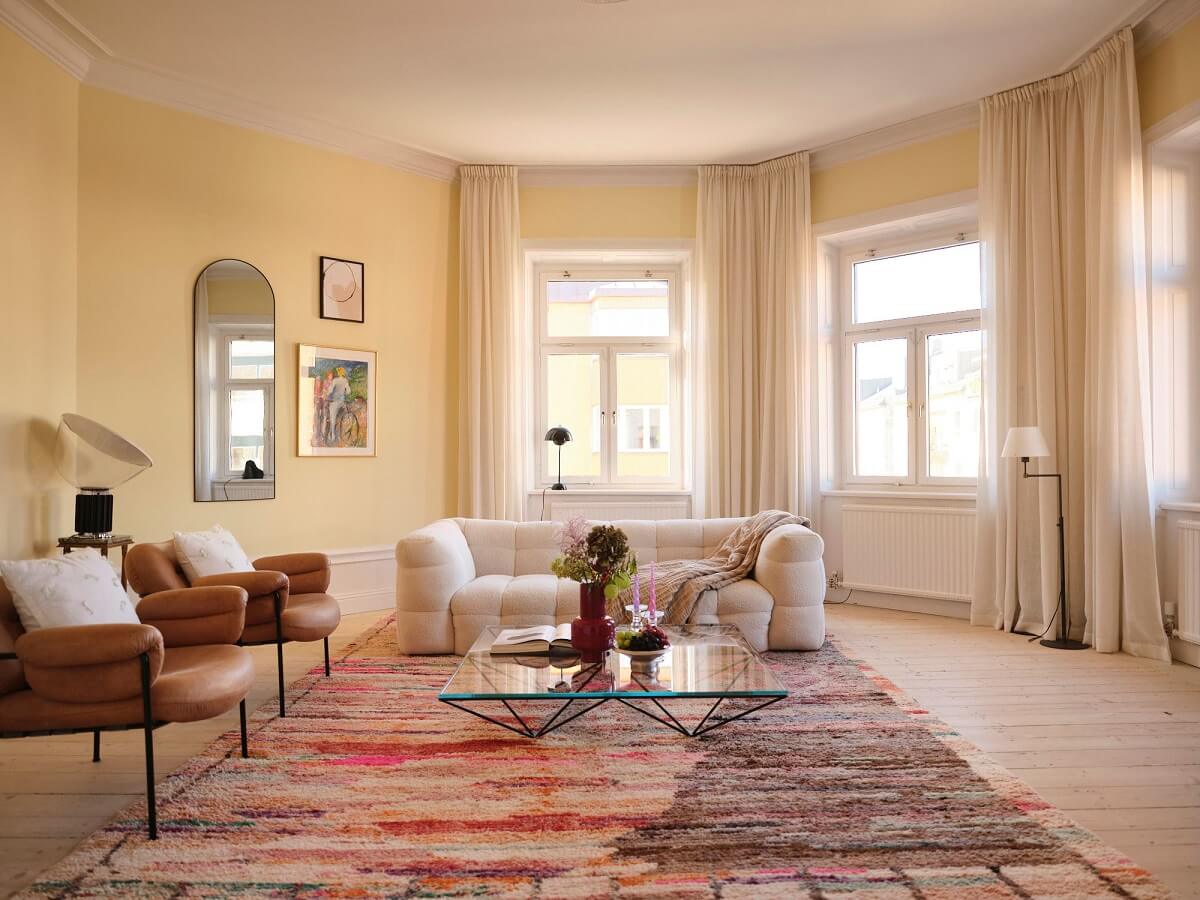 A Light Pastel Yellow and Pink Apartment in Stockholm 1 light spacious living room light yellow walls